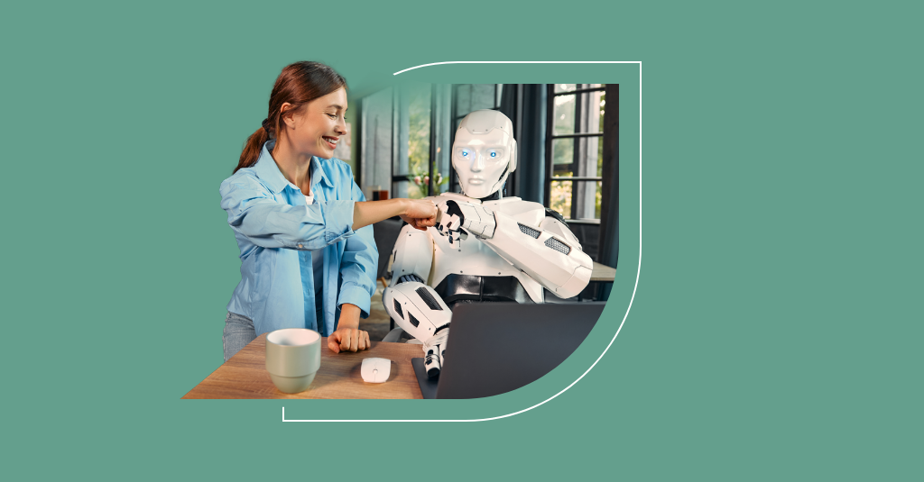 A woman fist bumps a robot at a desk, symbolizing the future of ITSM with seamless human-tech integration at SysAid. - SysAid