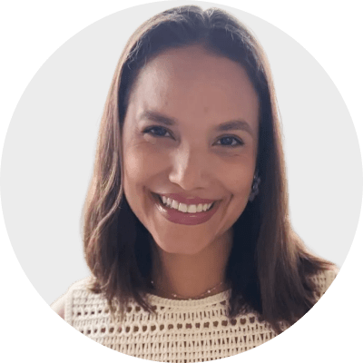 Professional woman smiling, representing SysAid ITSM excellence and user satisfaction in a modern service desk environment. - SysAid