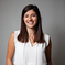 Professional woman smiling with confidence, reflecting SysAid's ITSM approach to service and support excellence. - SysAid