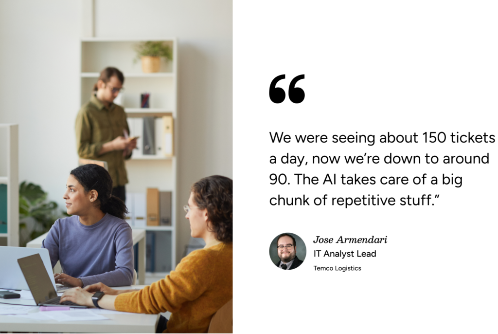 Professionals collaborate in a modern office as an ITSM-themed SysAid quote on AI’s impact is shown on the screen. - SysAid