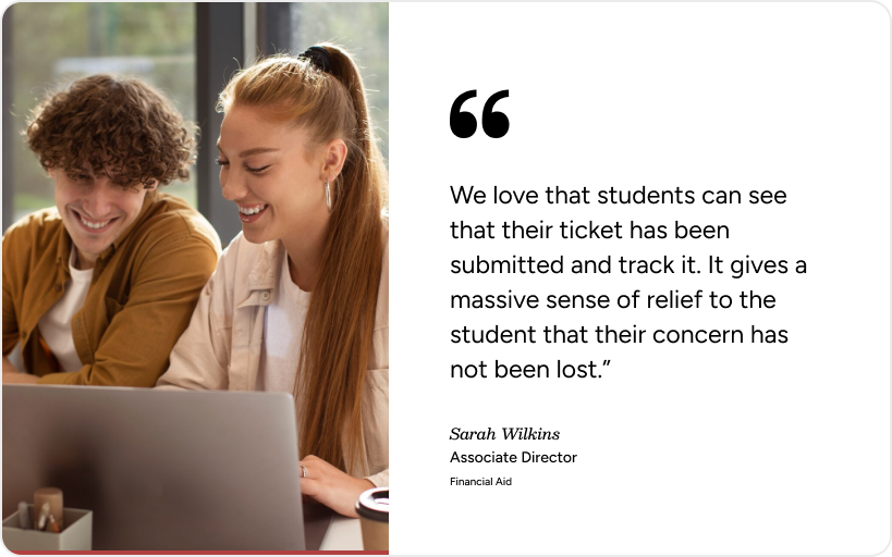 Two students review a laptop and ticket updates, highlighting SysAid’s Ticketing System for student support tracking. - SysAid